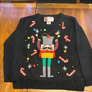 Light Up Black Crewneck Sweater with Festive Nutcracker Design size s